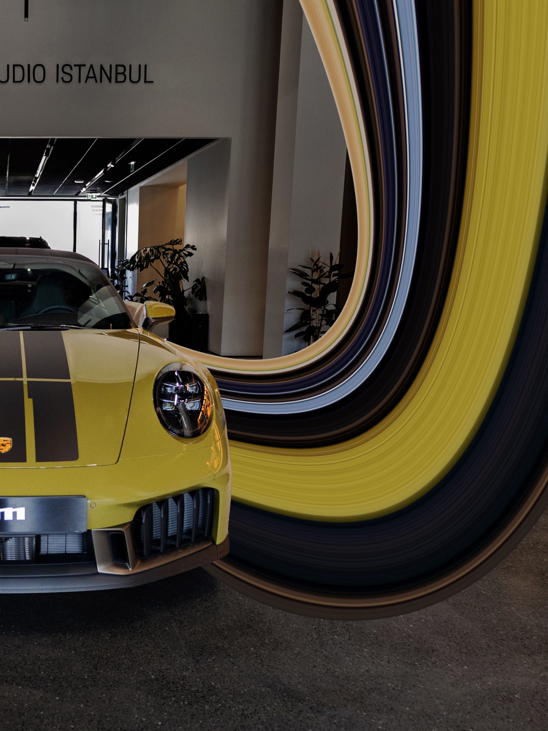 Retro stripe installation around a yellow 911, 3