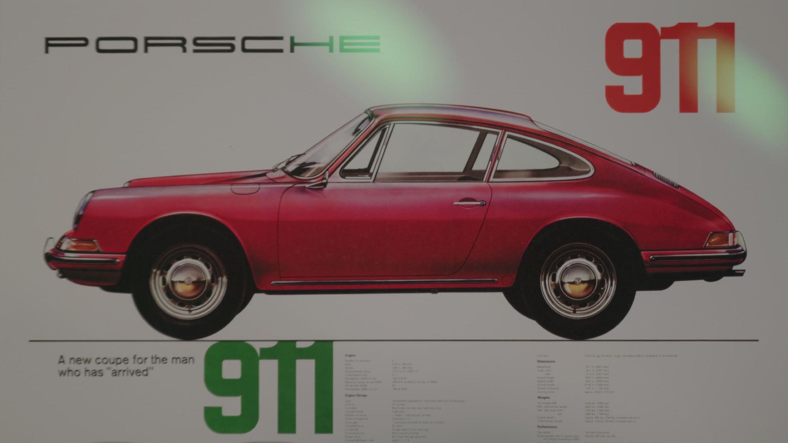 Vintage 911 poster on display in the studio